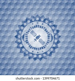 satelite icon inside blue emblem with geometric pattern.