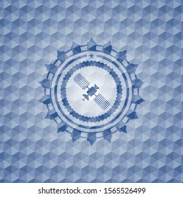 satelite icon inside blue emblem with geometric pattern.