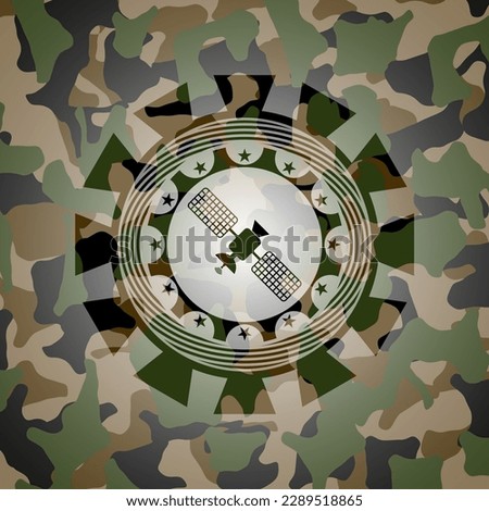 satelite icon inside camo texture. 