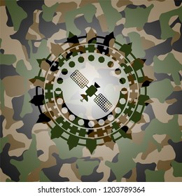 satelite icon inside camouflage texture