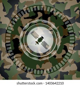 satelite icon inside camouflage texture