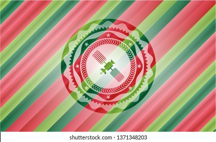 satelite icon inside christmas colors emblem.