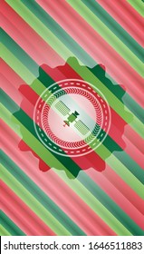 satelite icon inside christmas colors badge.