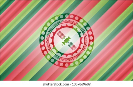 satelite icon inside christmas style badge..