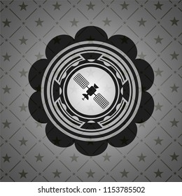 satelite icon inside dark emblem