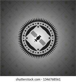satelite icon inside dark emblem