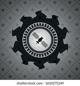 satelite icon inside dark emblem