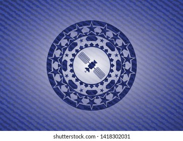 satelite icon inside emblem with denim high quality background