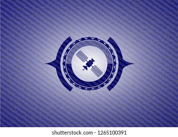 satelite icon inside emblem with jean texture