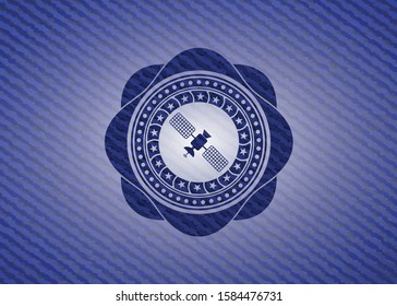satelite icon inside emblem with jean texture