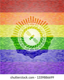 satelite icon inside emblem on mosaic background with the colors of the LGBT flag