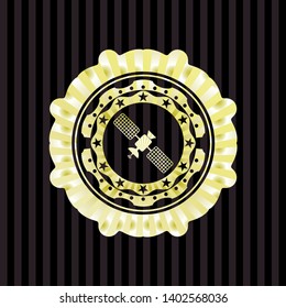 satelite icon inside gold badge