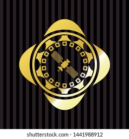 satelite icon inside golden badge