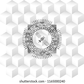 satelite icon inside grey icon or emblem with geometric cube white background