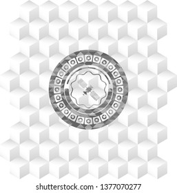 satelite icon inside grey icon or emblem with geometric cube white background