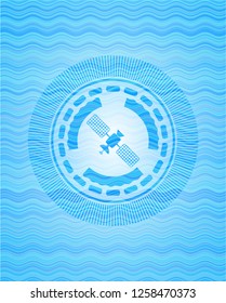 satelite icon inside light blue water wave emblem background.