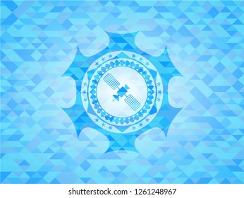 satelite icon inside light blue mosaic emblem