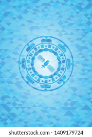 satelite icon inside light blue emblem with triangle mosaic background