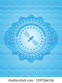 satelite icon inside light blue water style emblem.