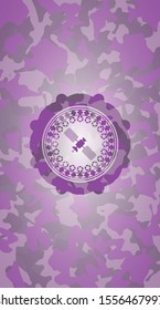 satelite icon inside pink camouflaged emblem