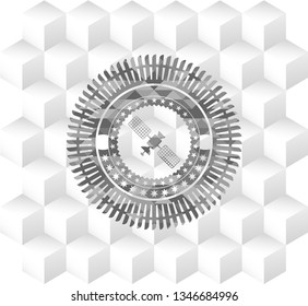 satelite icon inside realistic grey emblem with geometric cube white background
