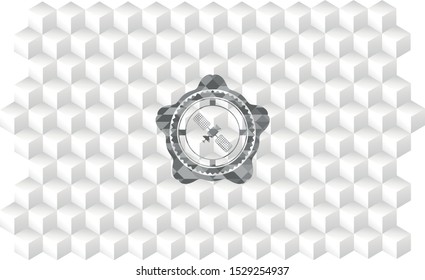 satelite icon inside realistic grey emblem with geometric cube white background
