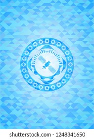 satelite icon inside realistic light blue mosaic emblem