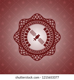 satelite icon inside realistic red emblem
