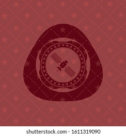 satelite icon inside realistic red emblem