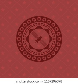 satelite icon inside red icon or emblem