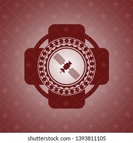 satelite icon inside red icon or emblem