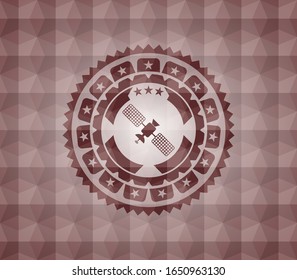 satelite icon inside red seamless emblem or badge with abstract geometric pattern background.