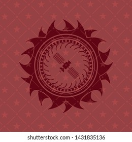 satelite icon inside retro red emblem