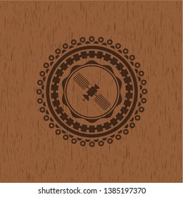 satelite icon inside retro style wooden emblem