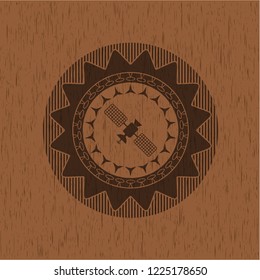 satelite icon inside retro wood emblem