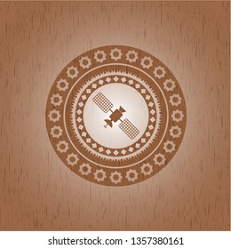 satelite icon inside retro wood emblem