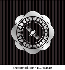 satelite icon inside silver badge or emblem