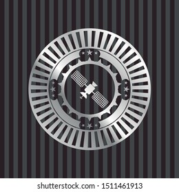 satelite icon inside silver badge