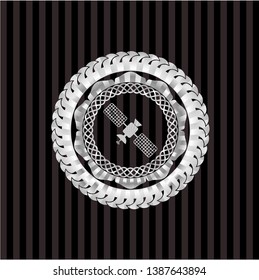 satelite icon inside silver emblem or badge
