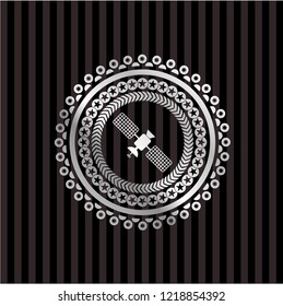 satelite icon inside silver shiny emblem