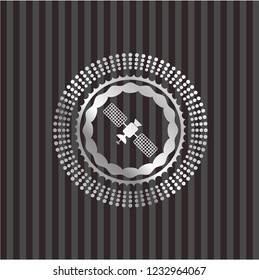 satelite icon inside silver shiny badge