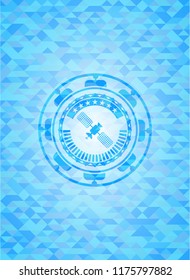 satelite icon inside sky blue emblem with mosaic background