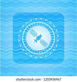 satelite icon inside sky blue water style badge.