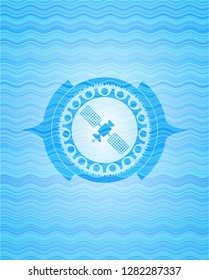 satelite icon inside sky blue water emblem background.
