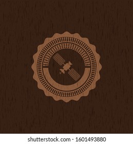 satelite icon inside vintage wood emblem