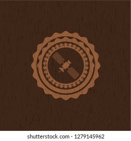 satelite icon inside vintage wooden emblem