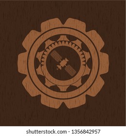 satelite icon inside wooden emblem. Retro