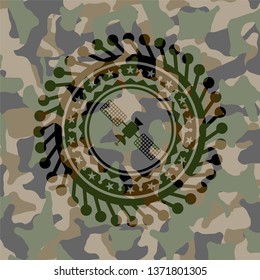 satelite icon on camo texture