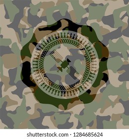 satelite icon on camouflage texture