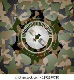 satelite icon on camouflaged texture